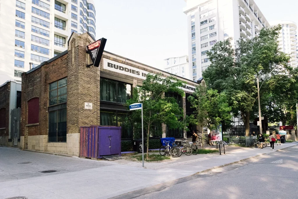Exterior of Buddies in Bad Times Theatre in Toronto, a renowned queer performance venue celebrated for championing LGBTQ+ voices and trans-inclusive arts.